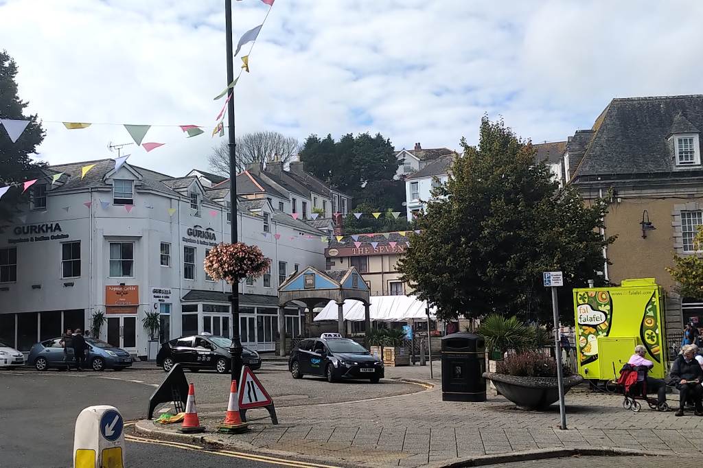 Picture of the taxi rank in The Moor in Falmouth with the Seven Stars and the Gurkha behind